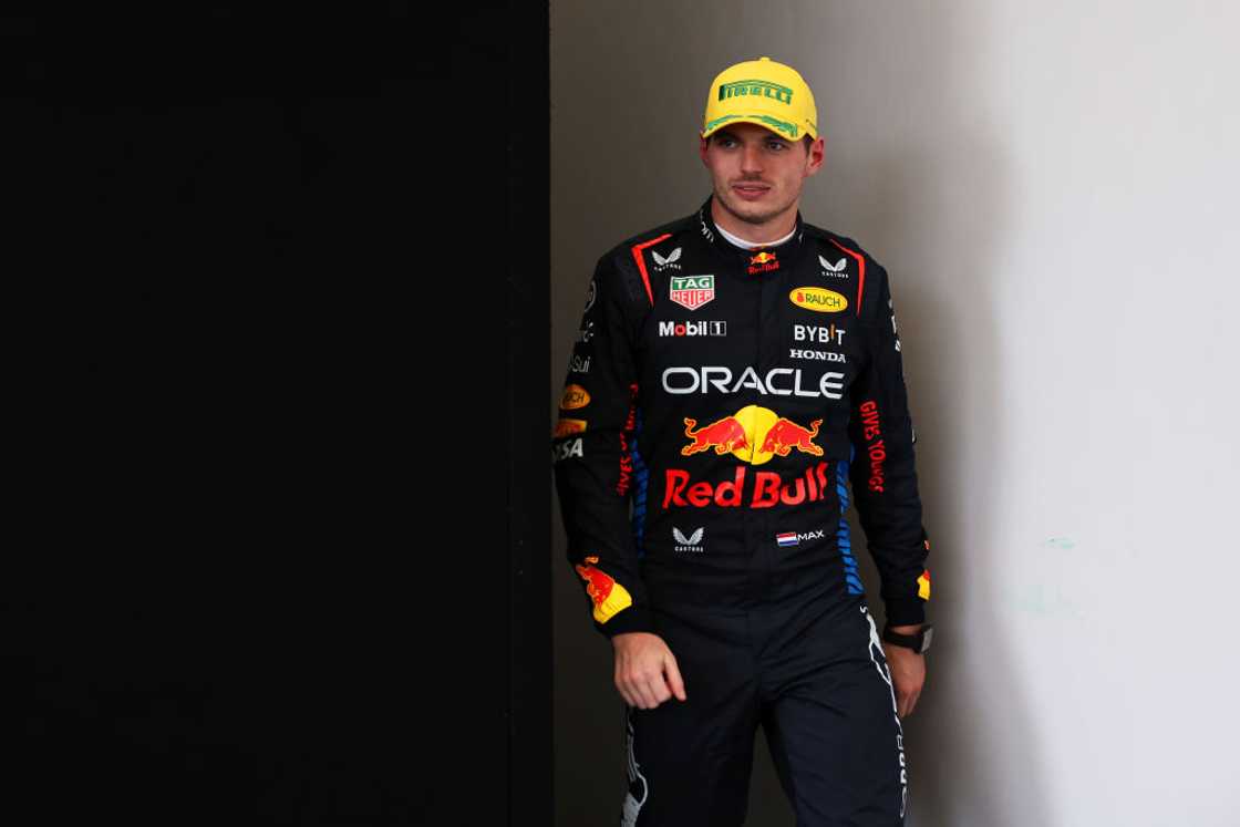 Max Verstappen walks to the podium after the F1 Grand Prix of Brazil