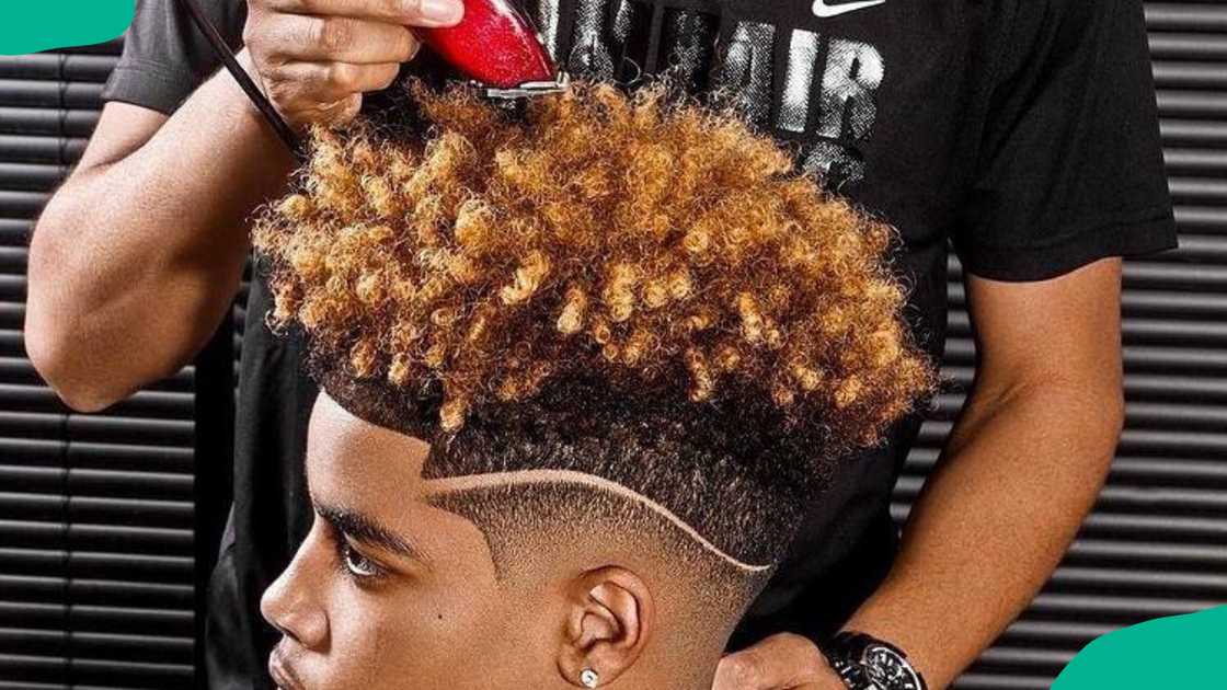 High fade with longer top curls design