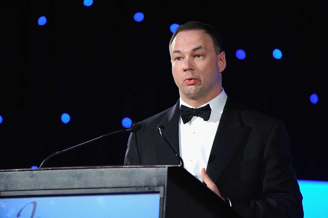 Thomas Tull speaks on stage at a fund raising ceremony