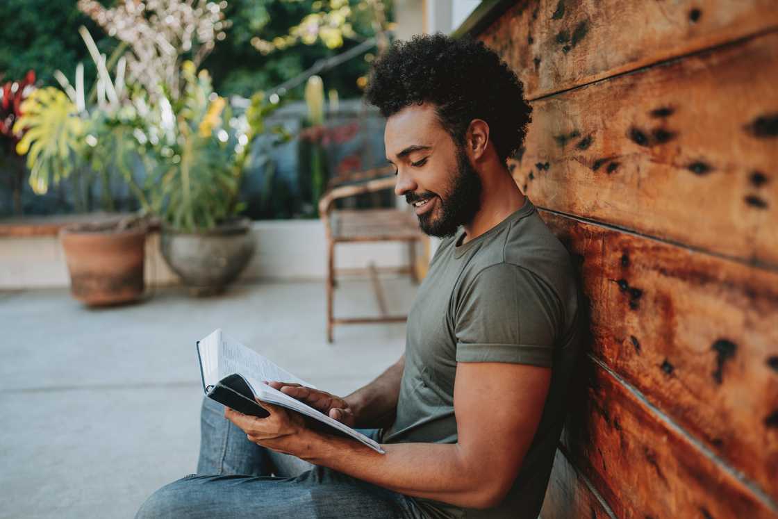 A young man reading the Bible