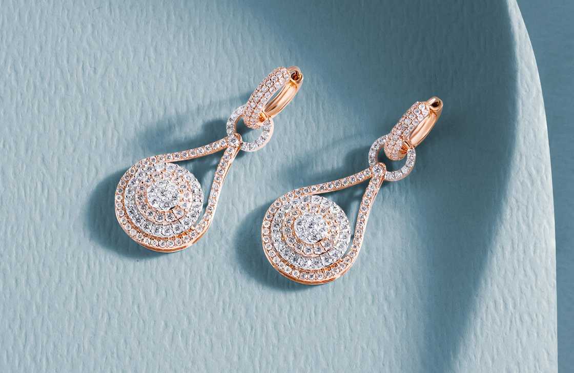 A close-up shot of a pair of diamond earring