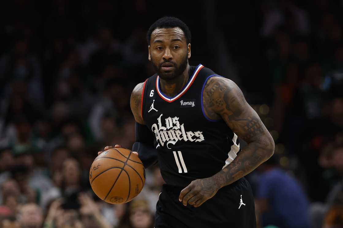 John Wall dribbles during the second half against the Boston Celtics at TD Garden in Boston, Massachusetts.