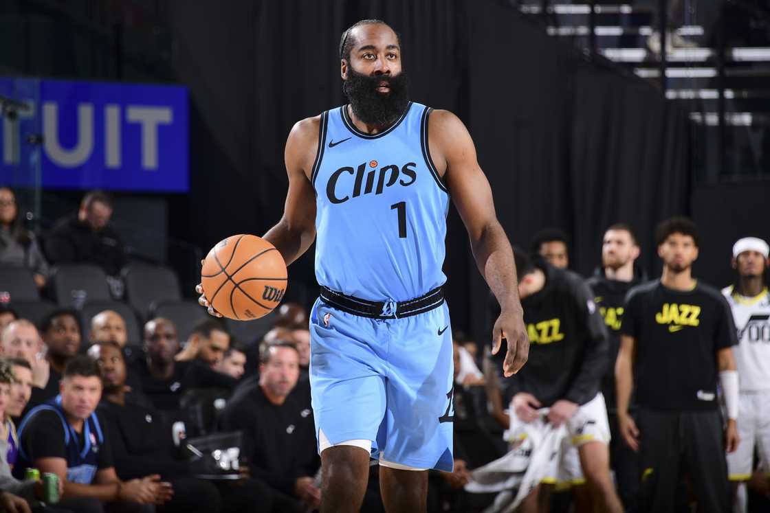 James Harden dribbles the ball during the game against the Utah Jazz at Intuit Dome in Los Angeles, California