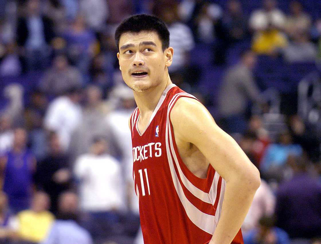 Yao Ming walks onto the court during the NBA game between the Los Angeles Lakers and the Houston Rockets