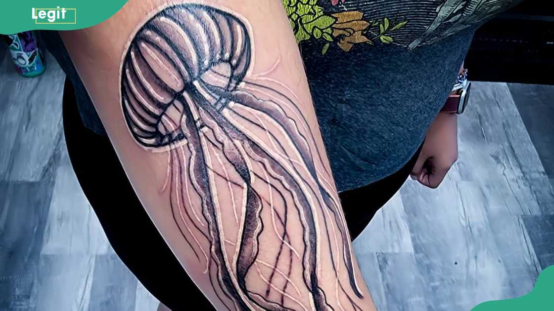 Tribal jellyfish tattoo