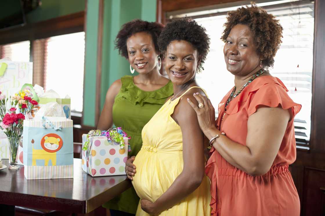 Women smiling at a baby shower