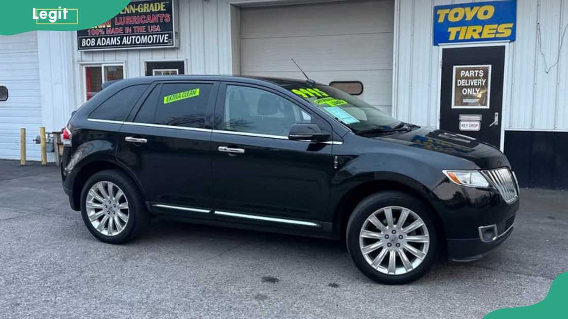 A black 2015 Lincoln MKX parked outdoors