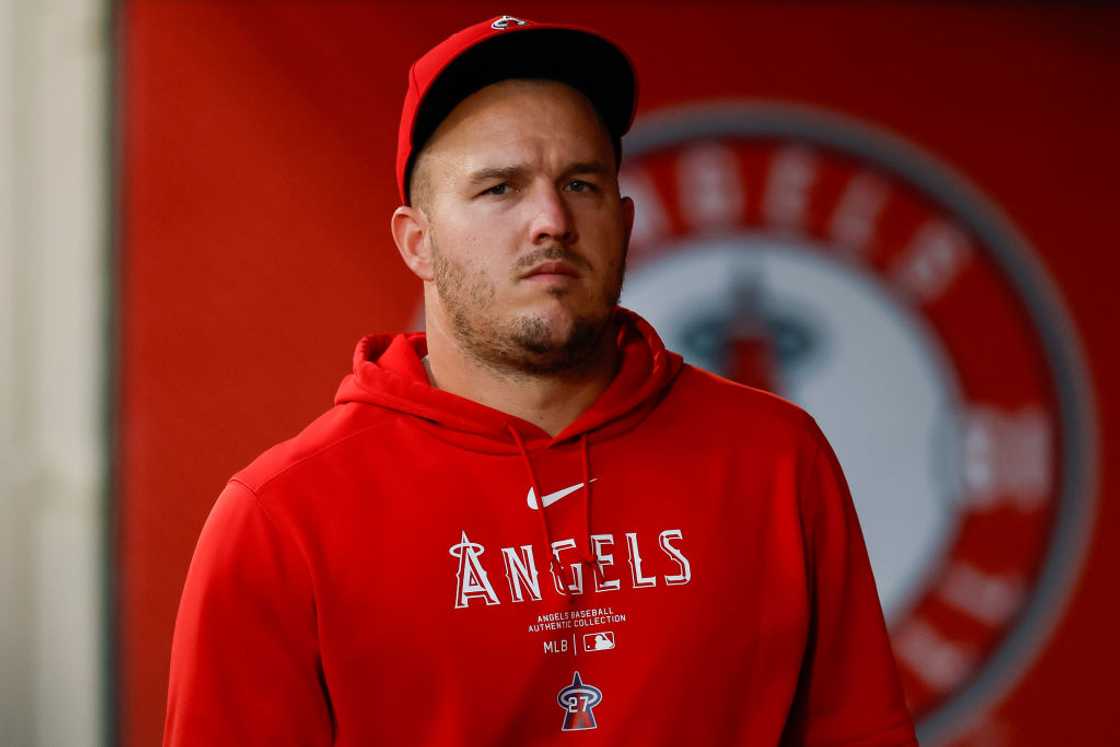 Mike Trout in a red hoodie and cap