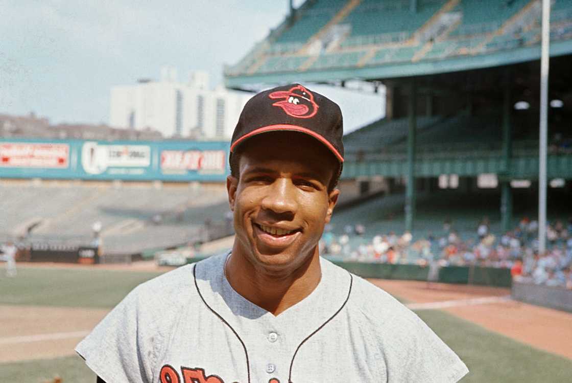 Frank Robinson poses for a photo