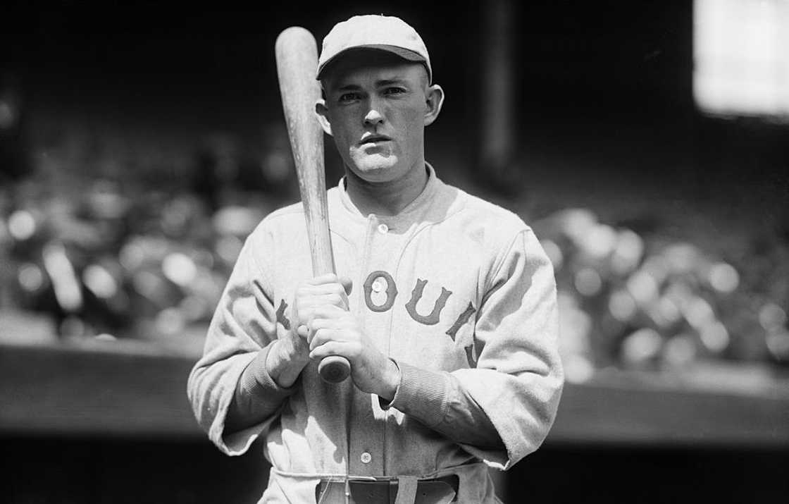 Rogers Hornsby of the St. Louis Cardinals holding a bat