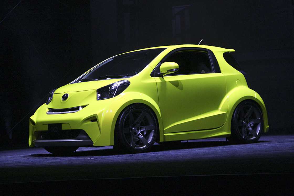 A neon yellow Scion iQ concept vehicle on display