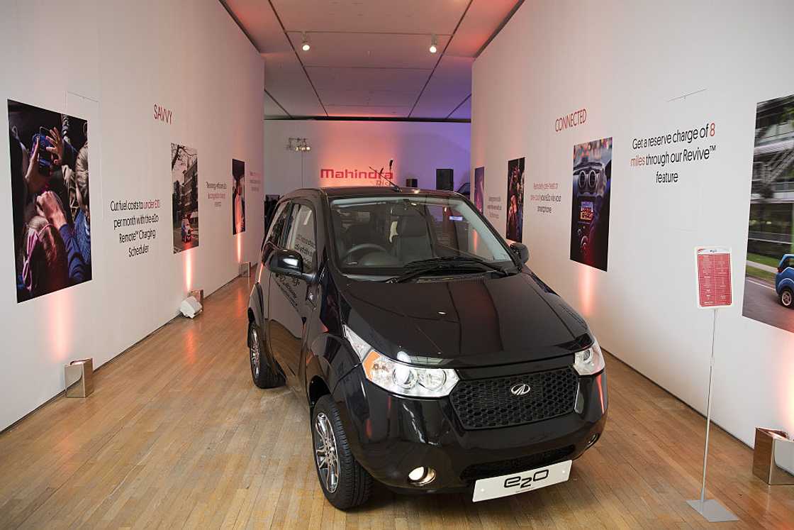 A black Mahindra e2o electric car on display