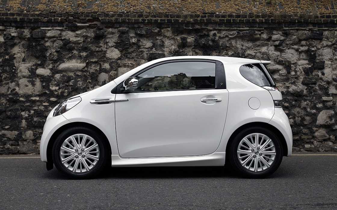 A white Aston Martin Cygnet packed