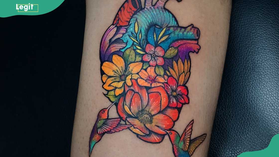 Hummingbird tattoo and a heart