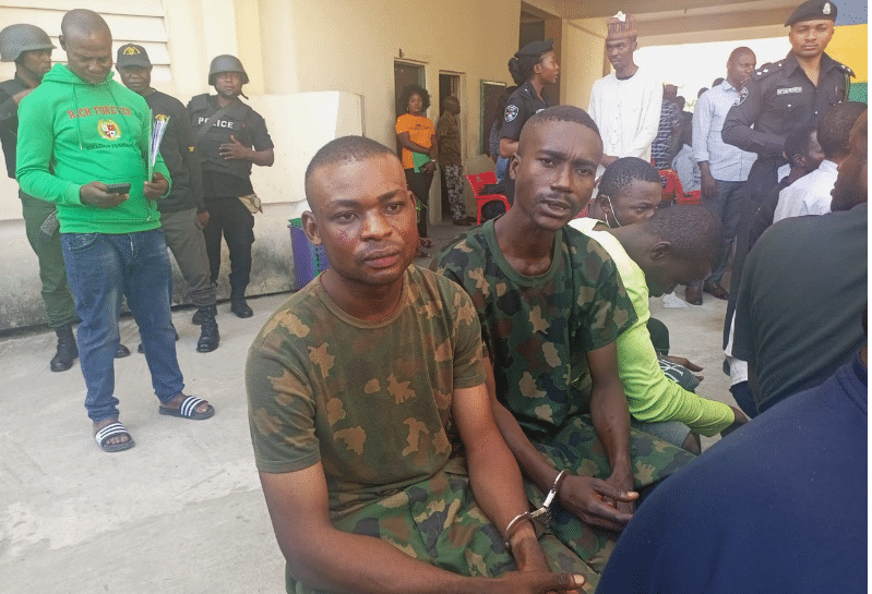 Police Arrest 'Soldiers' In Abuja After Purchasing Goods With Fake Alerts