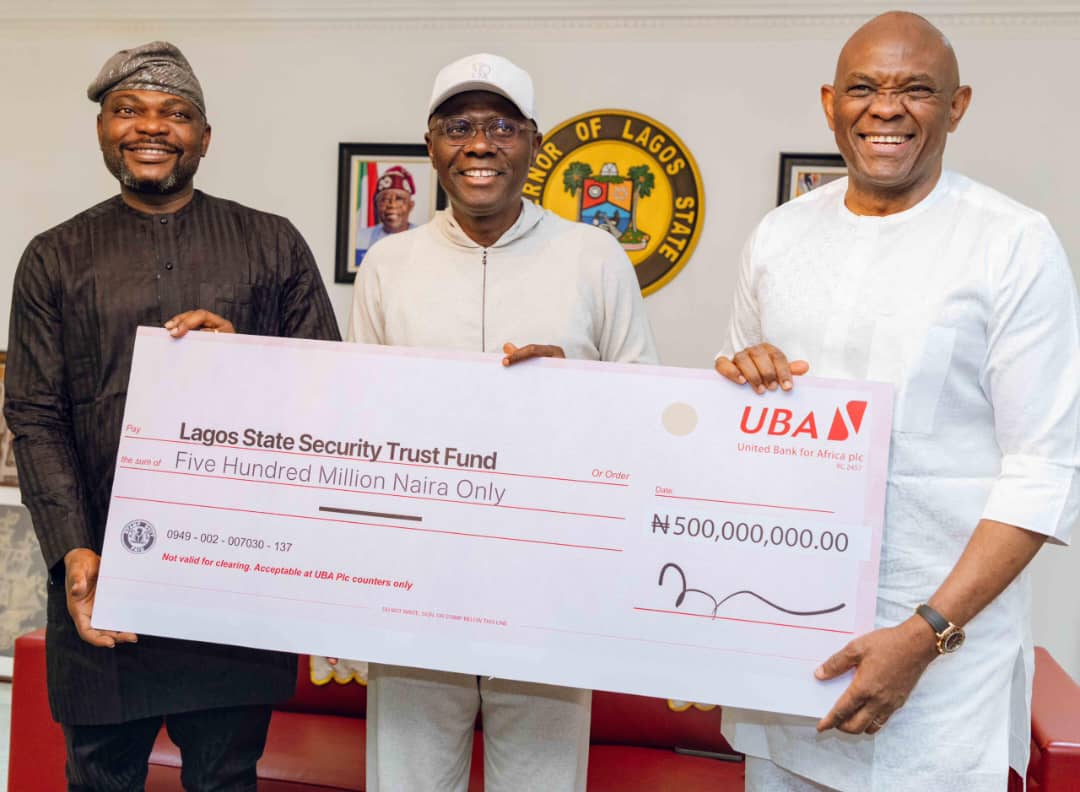 l-r: Group Deputy Managing Director, United Bank for Africa (UBA), Muyiwa Akinyemi; Lagos State Governor Babajide Sanwo-Olu; and Group Chairman, UBA, Mr. Tony Elumelu, during the presentation of N500m to Lagos State Security Fund by UBA Foundation, the corporate social responsibility arm of UBA, held at Lagos House, Marina on Sunday.