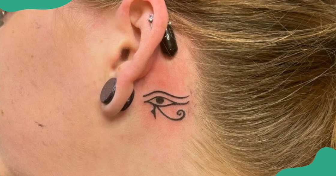 An Eye of Horus tattoo on the ear