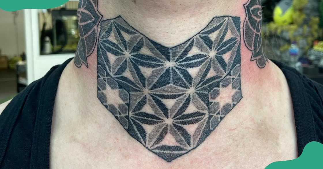 Throat tattoo with triangles