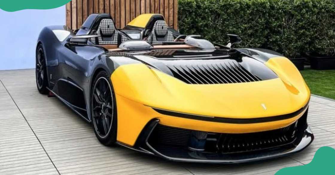 A black and yellow Pininfarina B95