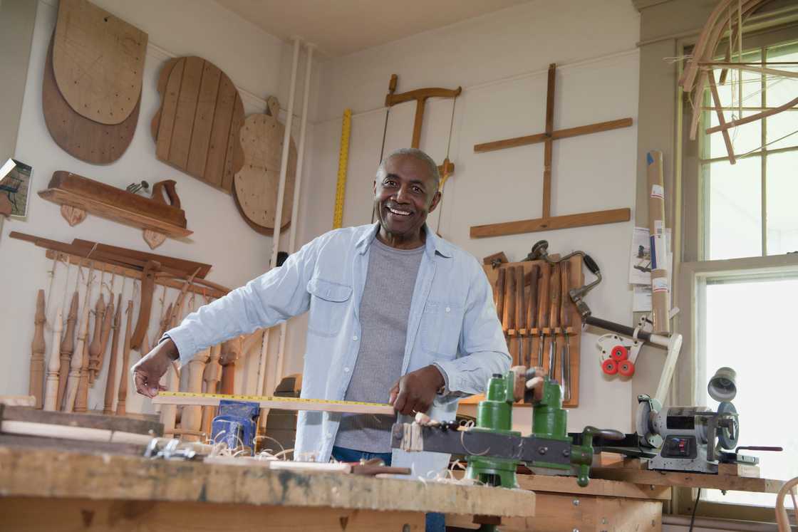 A carpenter at his workshop