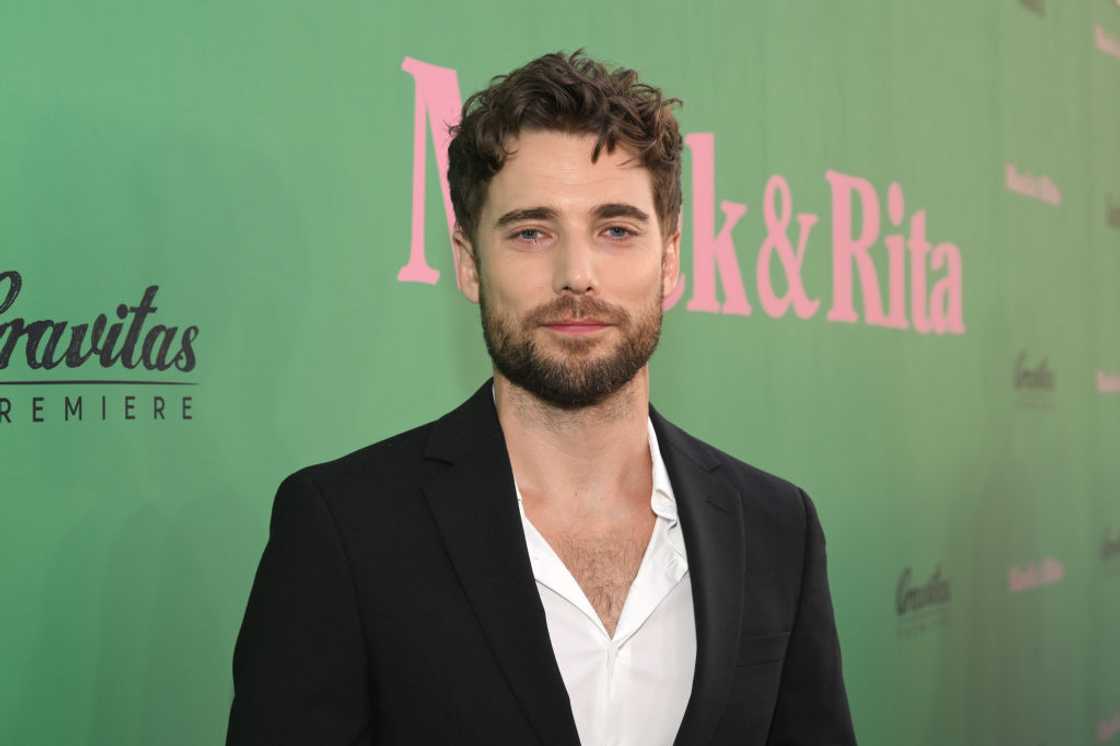 Dustin Milligan attends a movie premiere in California