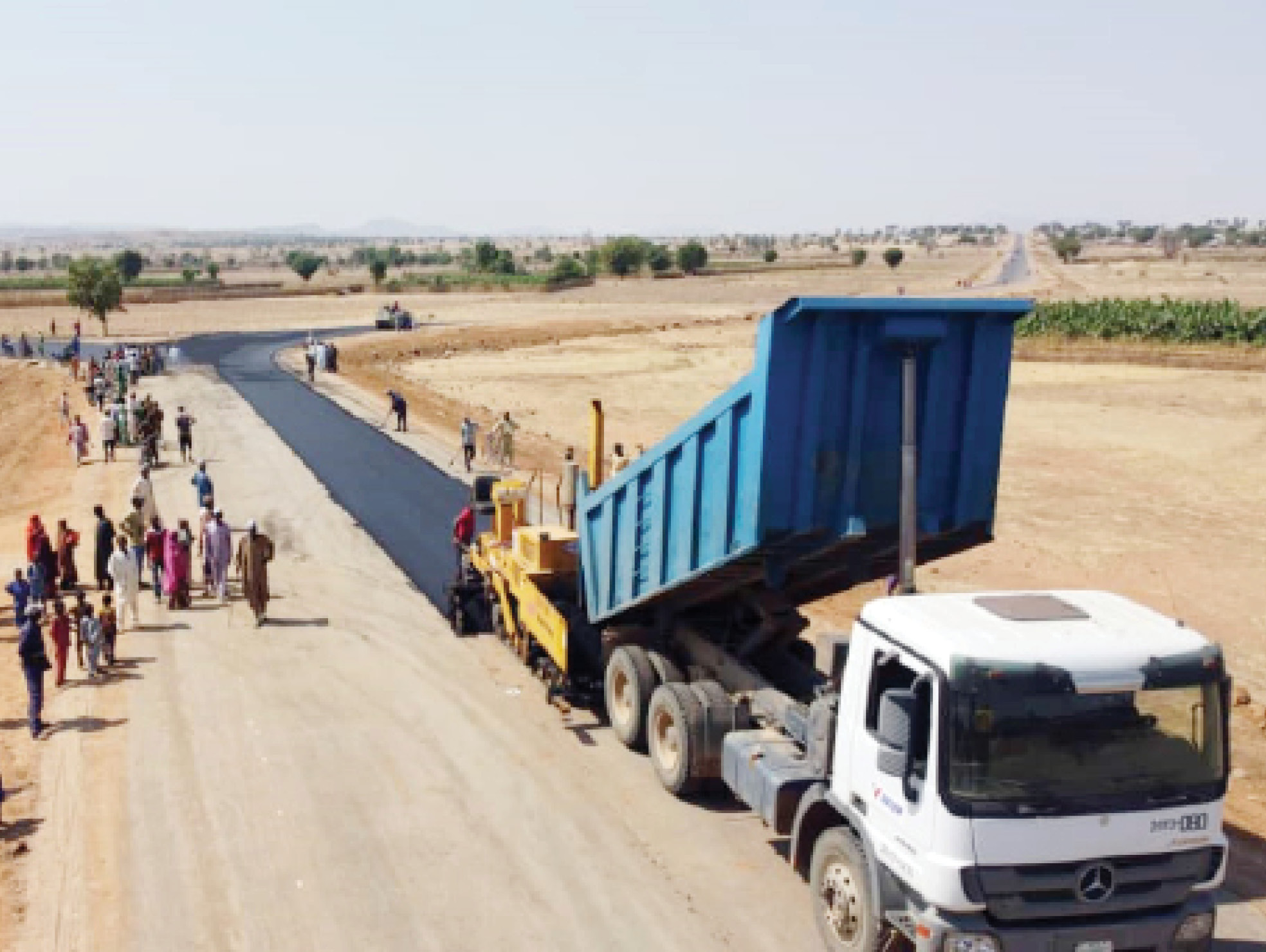 Work Advances On Ture-Galengu Road With Asphalt Laying In Progress