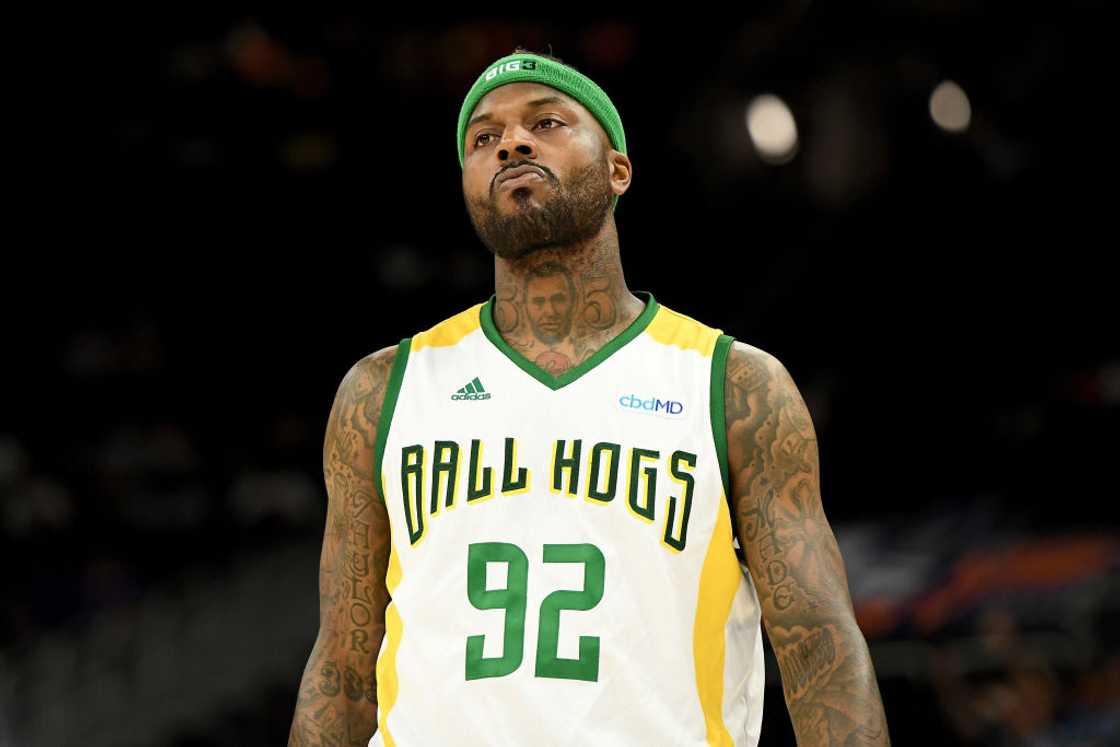 DeShawn Stevenson walks across the court before the game against the Trilogy