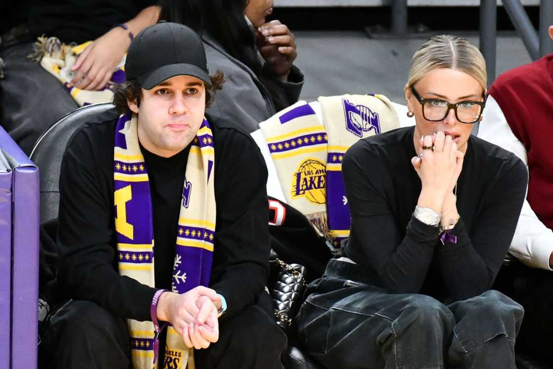 David Dobrik and Corinna Kopf attend a basketball game