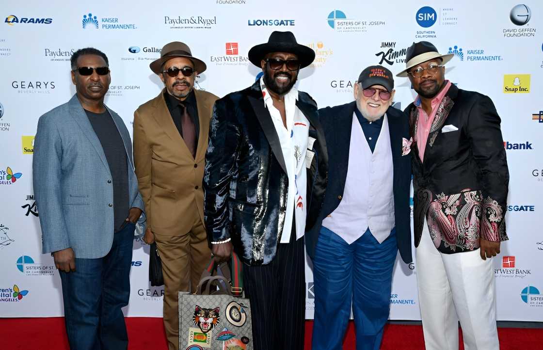 R&B singers Terry Weeks, Ronald Tyson, Otis Williams of The Temptations, Shelley Berger and singer Anthony Grant of The Temptations at Petersen Automotive Museum